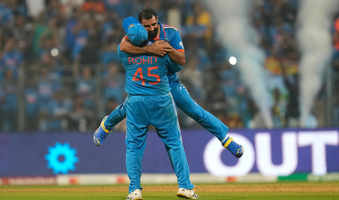 Breaking records, Kohli and Shami lead India to the World Cup final.